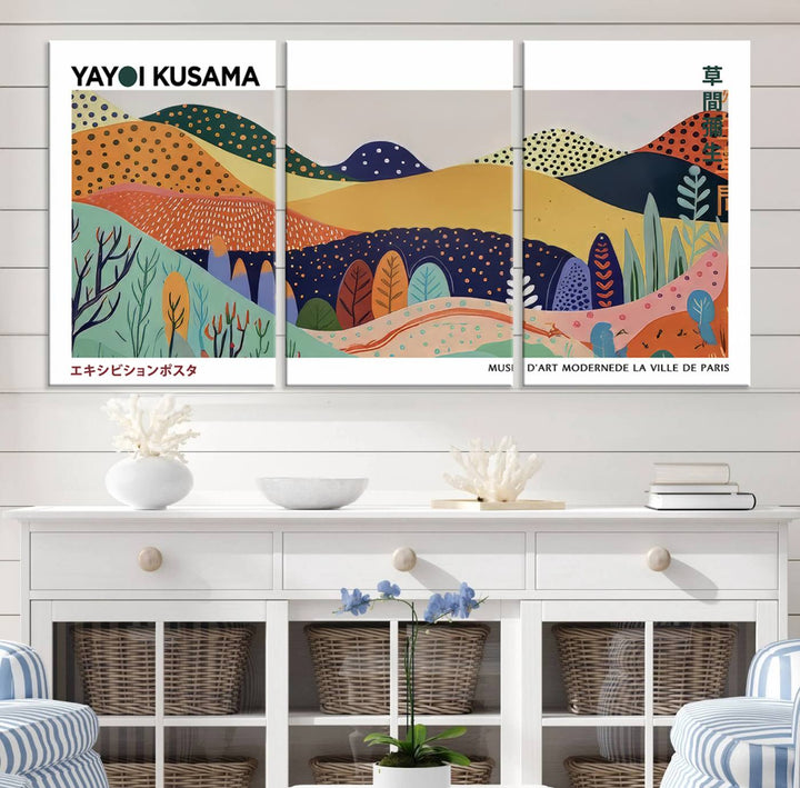 A triptych featuring the Framed Yayoi Kusama 1986 Wall Art Print hangs above. This Japanese Wabi Sabi inspired piece, rich in vibrant abstract landscapes, adds an elegant touch to any nature-inspired décor.