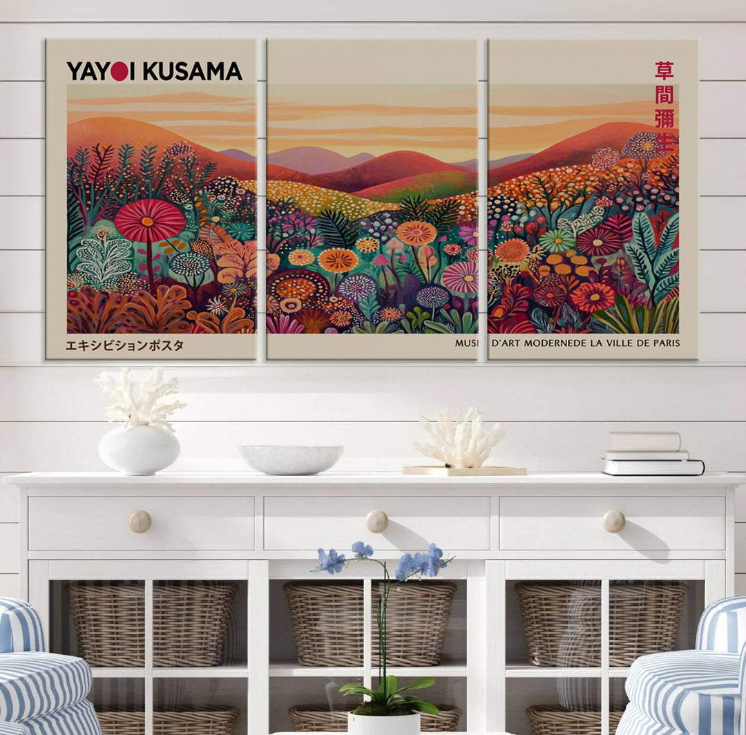 The room is adorned with a triptych artwork depicting colorful flowers and hills, incorporating the "Framed Yayoi Kusama 1986 Wall Art Print" – a vibrant abstract landscape canvas print that blends Japanese Wabi Sabi themes into contemporary nature-inspired décor.