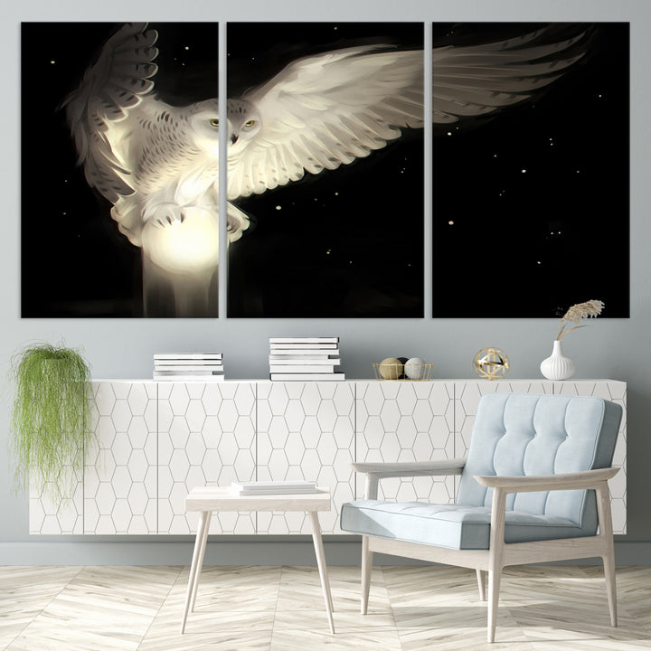 The Night Owl Art graces the wall with its depiction of a snowy owl on a glowing orb, perfect for modern decor.