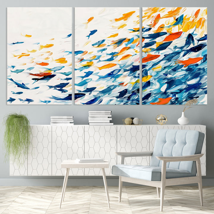 A colorful Abstract Fish Shoal Canvas Print hangs on the wall.