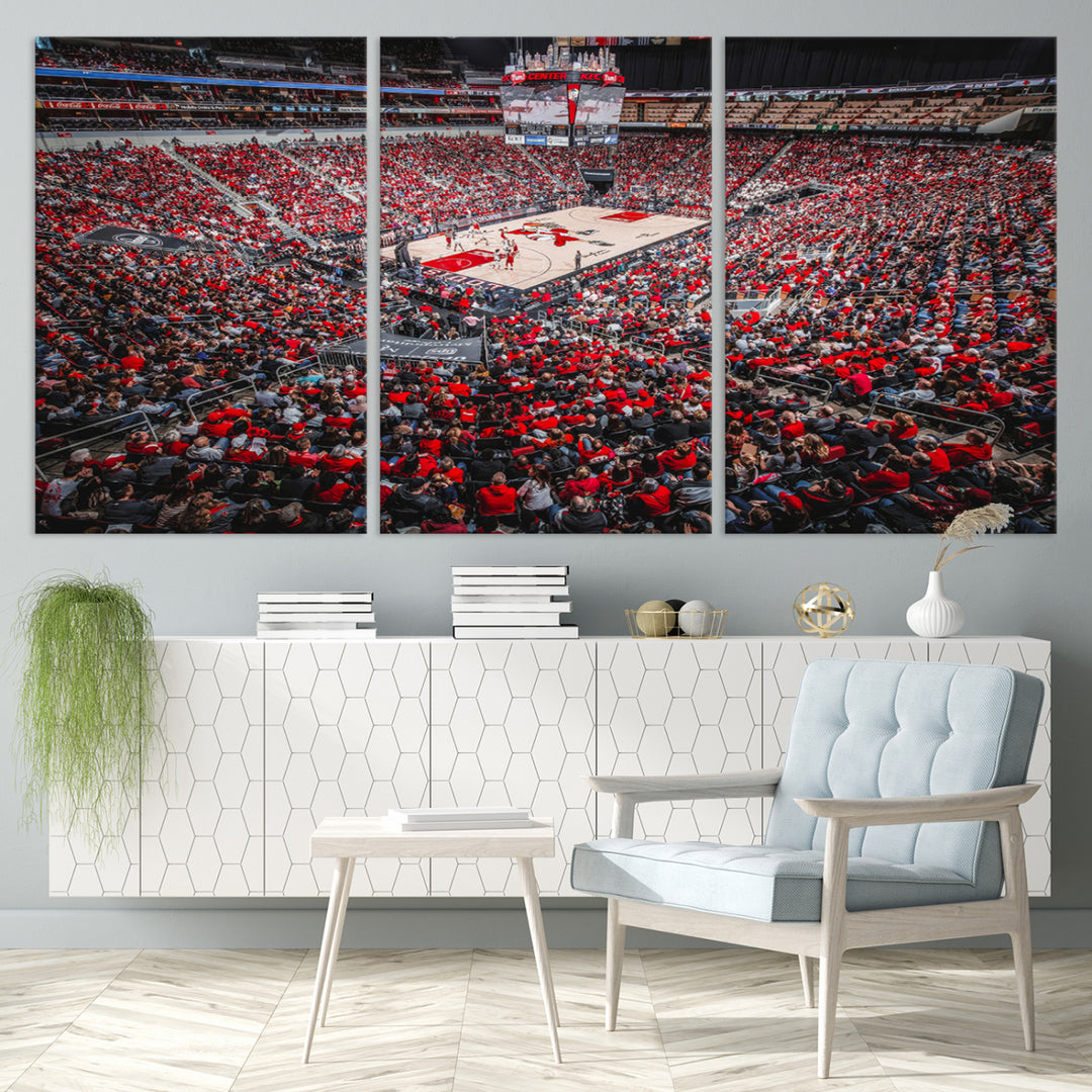 A painting of Louisville Cardinals fans in red at the KFC Yum Center Arena.