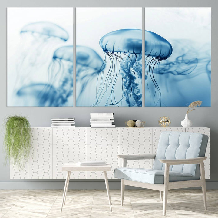 A breathtaking triptych of the Blue Jellyfish Wall Art Canvas Print decorates the space, beautifully highlighted by an overhead lamp. Each canvas is created on museum-quality material using high-resolution printing and includes a UV-protective coating to ensure long-lasting vibrancy.