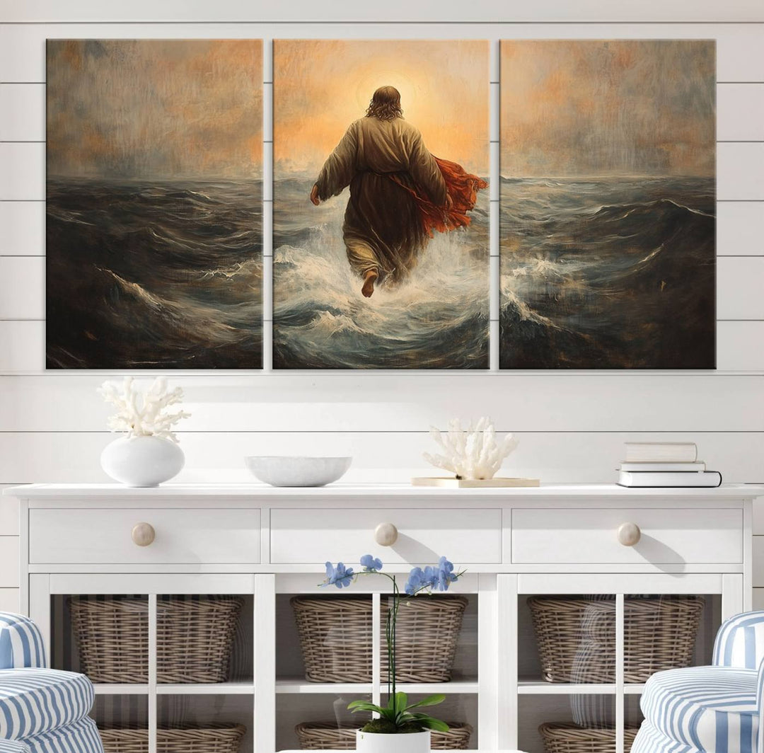 A modern living room is adorned with a triptych titled "Jesus Walking on Water, Christian Wall Art, Jesus Christ Walking on Oil Painting Style Print." The artwork, presented on museum-quality canvas, showcases vibrant colors and exquisite detail.