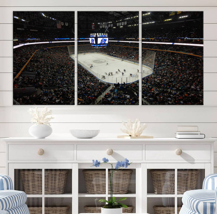 The nautical-themed room is enhanced by the KeyBank Center New York Buffalo Sabres Hockey Stadium Wall Art Canvas Print, a three-panel depiction of a bustling hockey arena with a gallery-quality finish. This canvas artwork, handmade in the USA, introduces an element of sporting elegance to your decor.