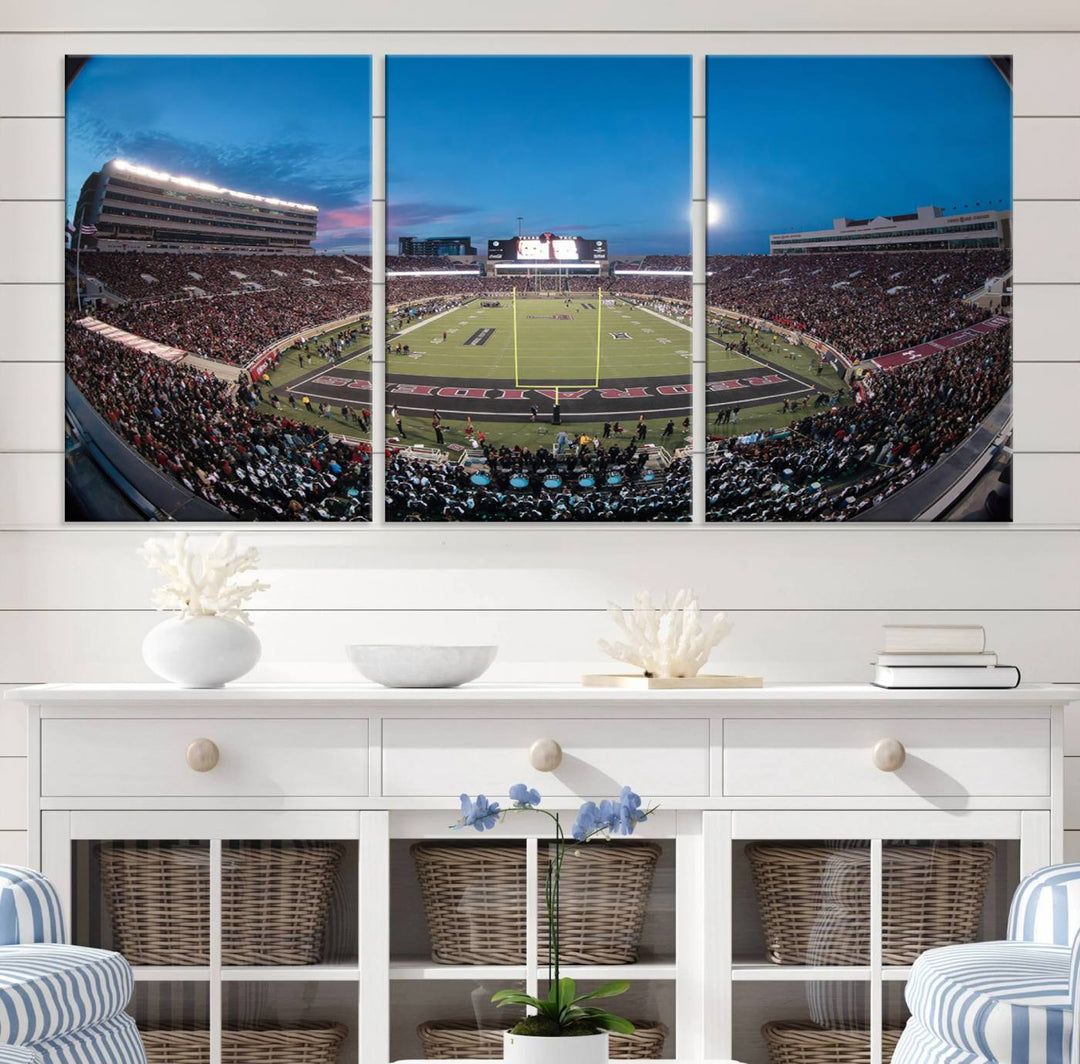 The wall art in the living room features a Texas Tech Red Raiders Football Team Print, showcasing Jones AT&T Stadium at dusk.