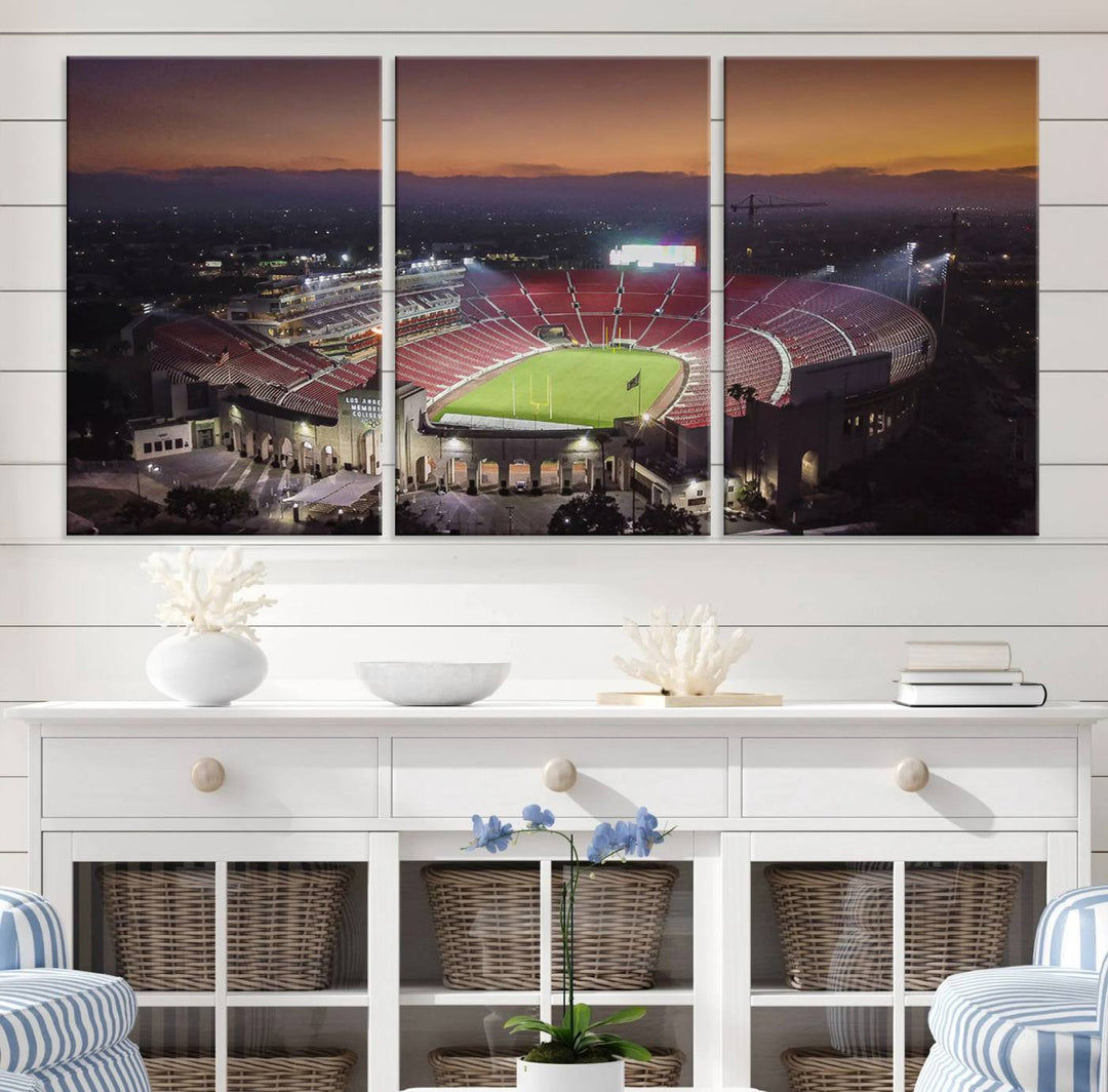 The USC Trojans Stadium canvas captures Memorial Coliseum at twilight, showcasing red seats and a green field beneath an orange sky.