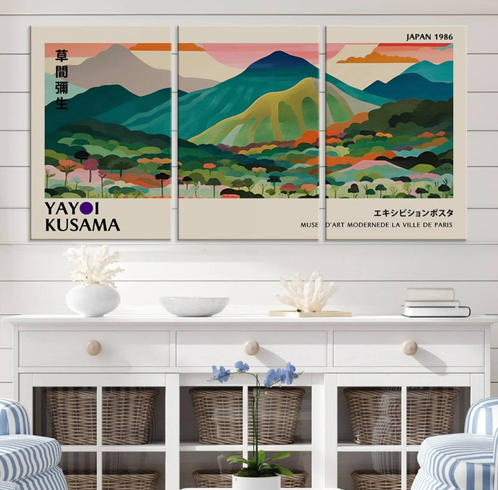 Vibrant abstract world map print featuring mountains and trees, including the text Yayoi Kusama and Japan 1986.