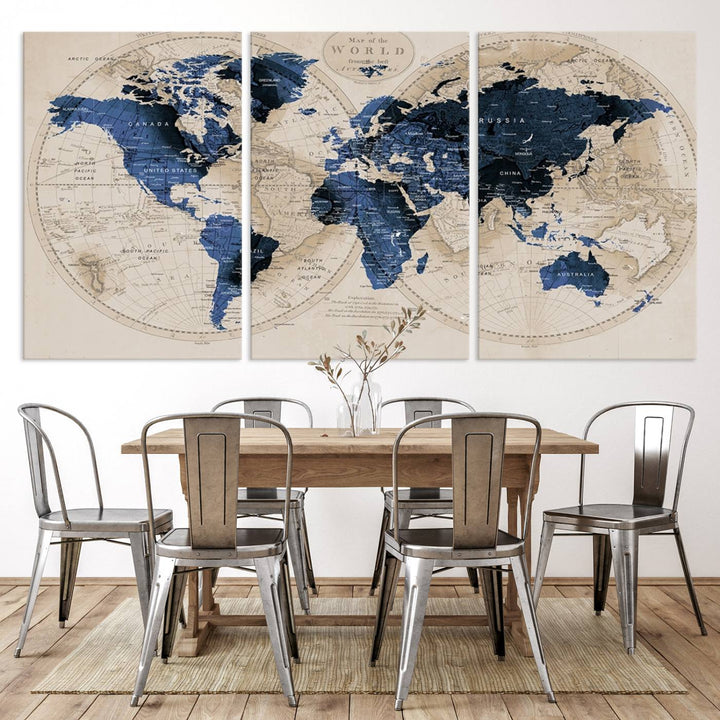 The Vintage Triptych Map Print is a grunge-stained blue and beige world map, perfect for enhancing wall decor.