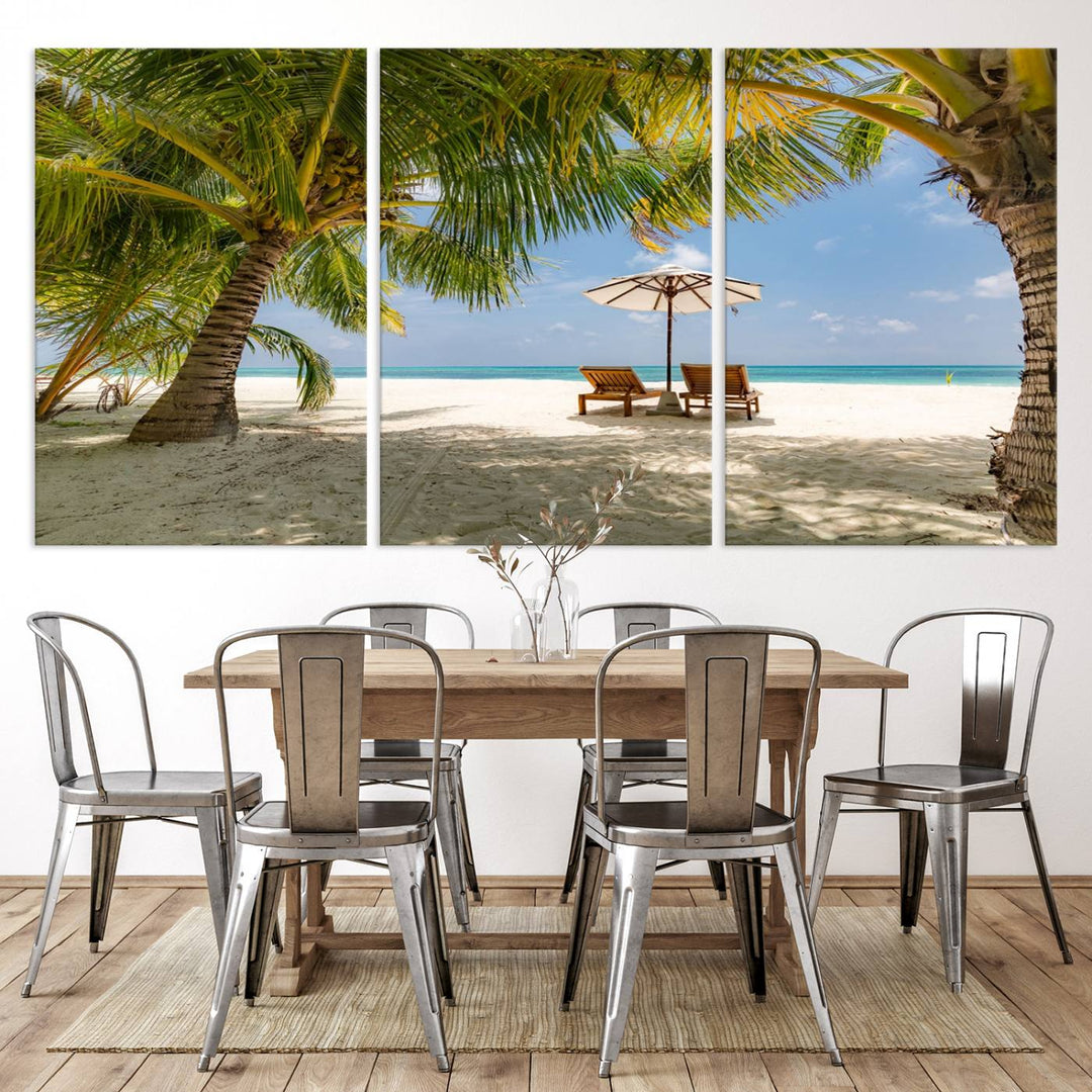 The canvas art print titled Lounge Chairs Palm Trees on Tropical Beach offers free shipping.