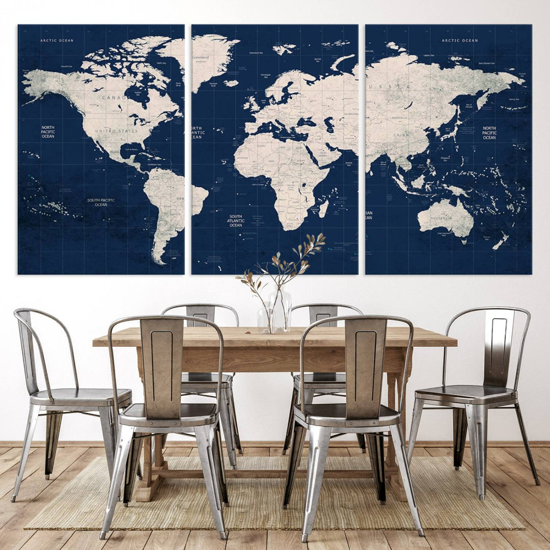 Large modern world map wall art canvas print in beige and navy; showcases a 3-panel vintage map design and is ready to hang.