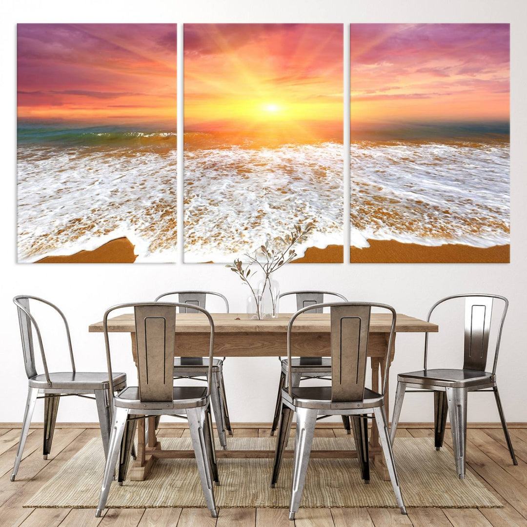 Golden Beach Sunrise 3-panel canvas art of ocean waves, hung on a wooden wall.