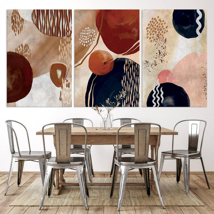 The Boho Neutral Canvas Print Set with earthy tones and circles hangs on the wall.