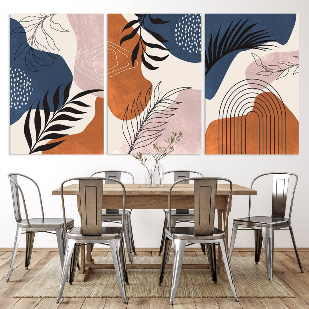 Boho Wall Art Canvas Print Set showcases mid-century geometric and leaf motifs in blue, ochre, and pink.