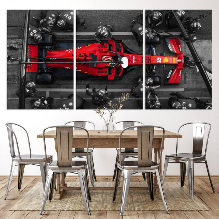 The Ferrari Pit Stop Canvas Wall Art features bold motorsport imagery that captures the precision and speed of Formula 1.