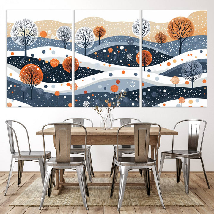 The "Abstract Winter Landscape Canvas Wall Art Print," featuring a triptych of landscapes with trees and hills in vibrant orange, white, and blue hues, adds a gallery-quality finish that transforms the space into an art lover's dream.