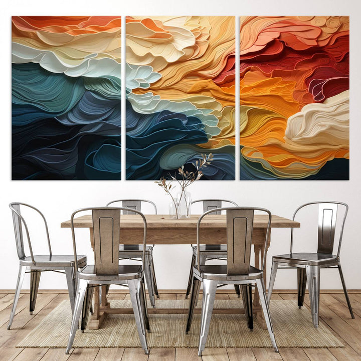 A Blue Orange Abstract Wave Wall Art Canvas Print adorns the wall. This colorful masterpiece is professionally hand-assembled to enhance any space.