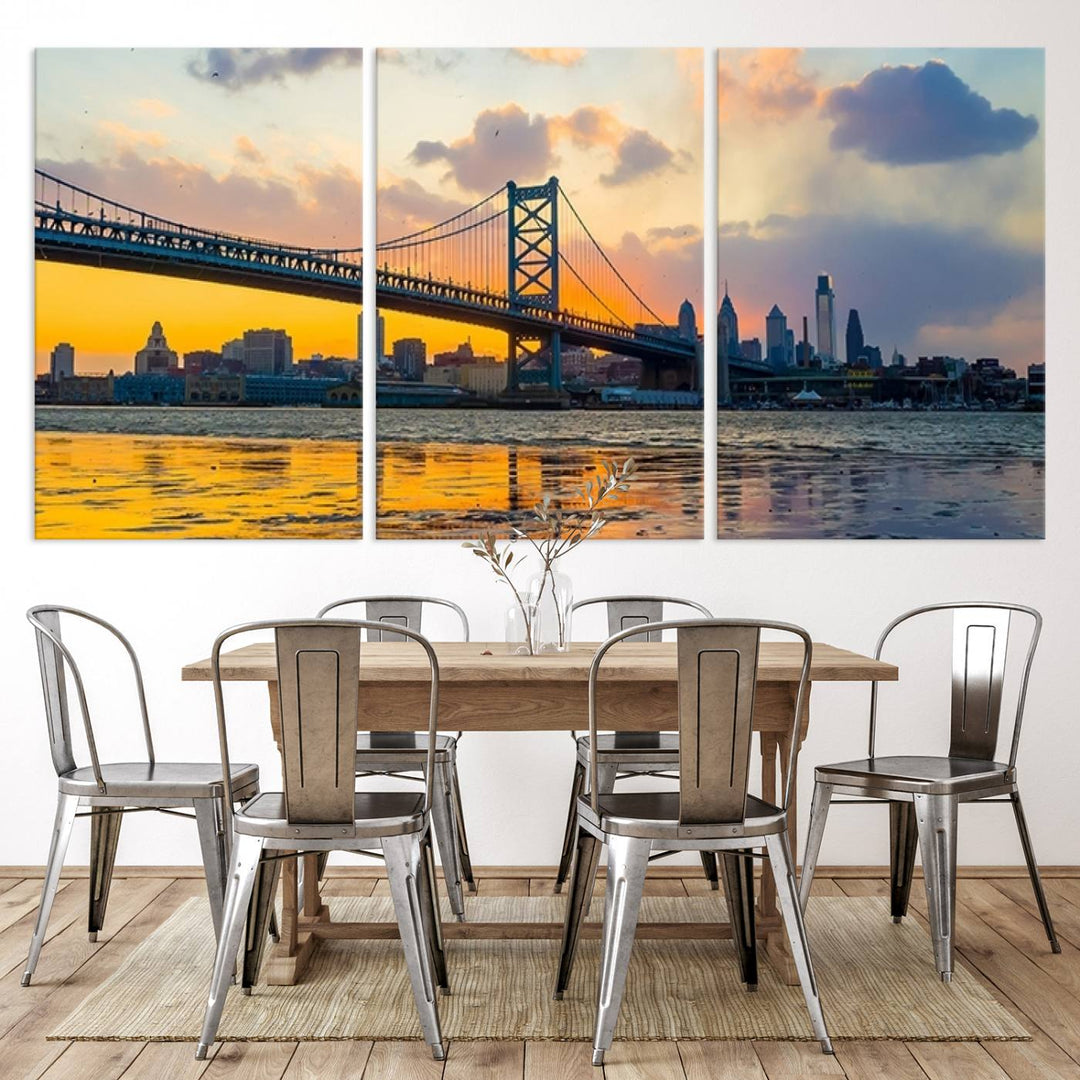 Philadelphia skyline sunset over Ben Franklin Bridge, 3-panel Giclée canvas print. Perfect wall art for office, dining room, or living room decor.