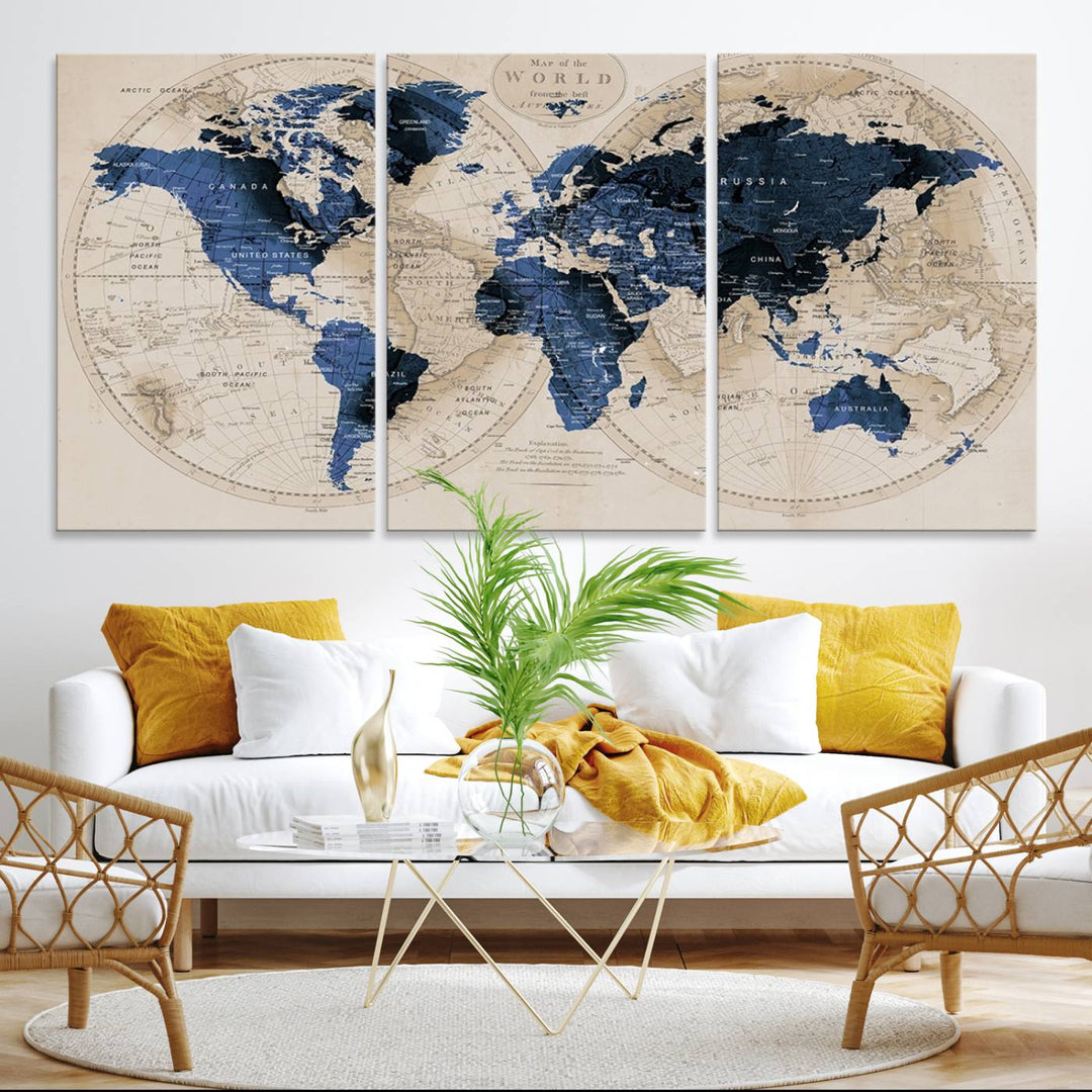The Vintage Triptych Map Print is a grunge-stained blue and beige world map, perfect for enhancing wall decor.