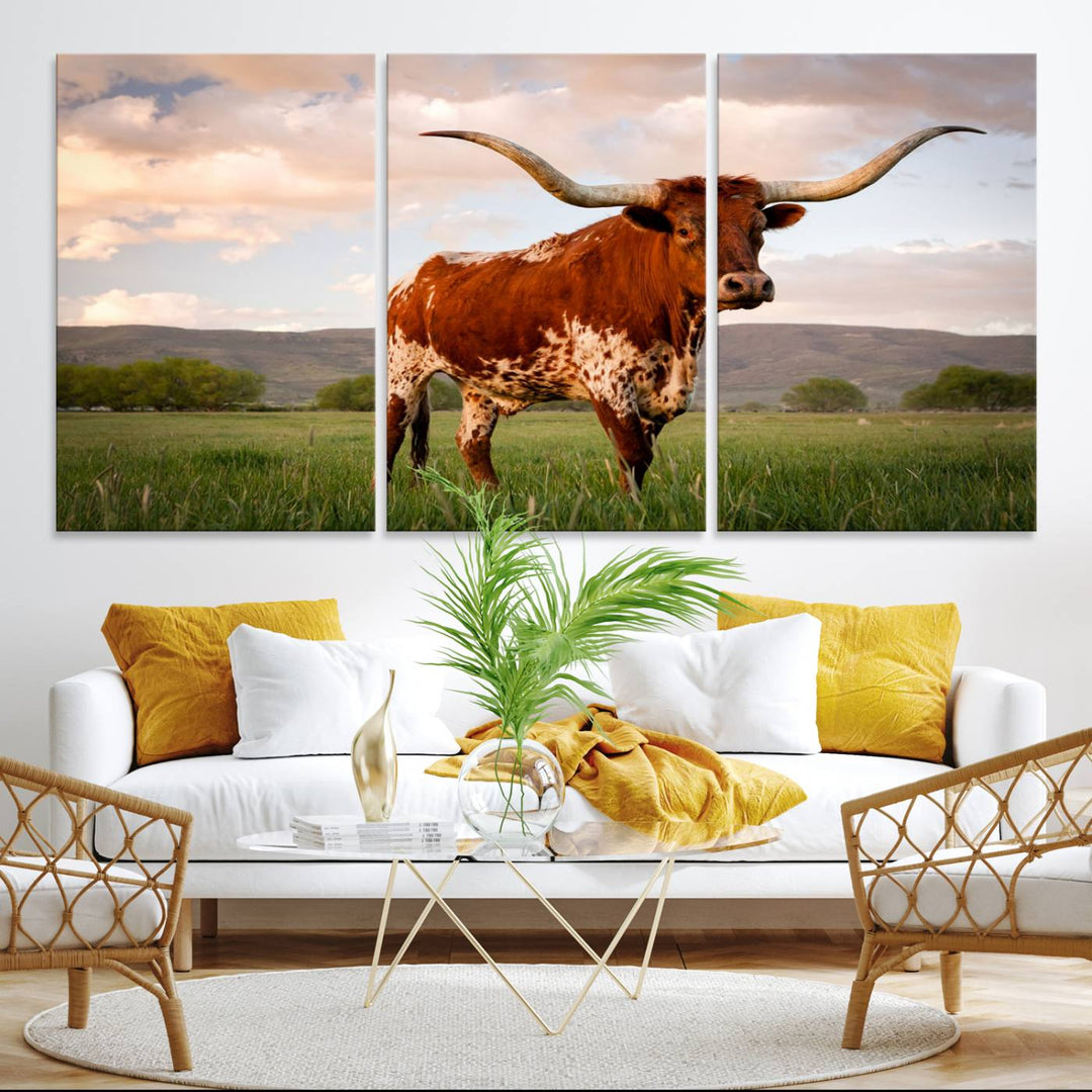 The Texas Cow Canvas Wall Art print captures a longhorn cow at sunset and is ready to hang.