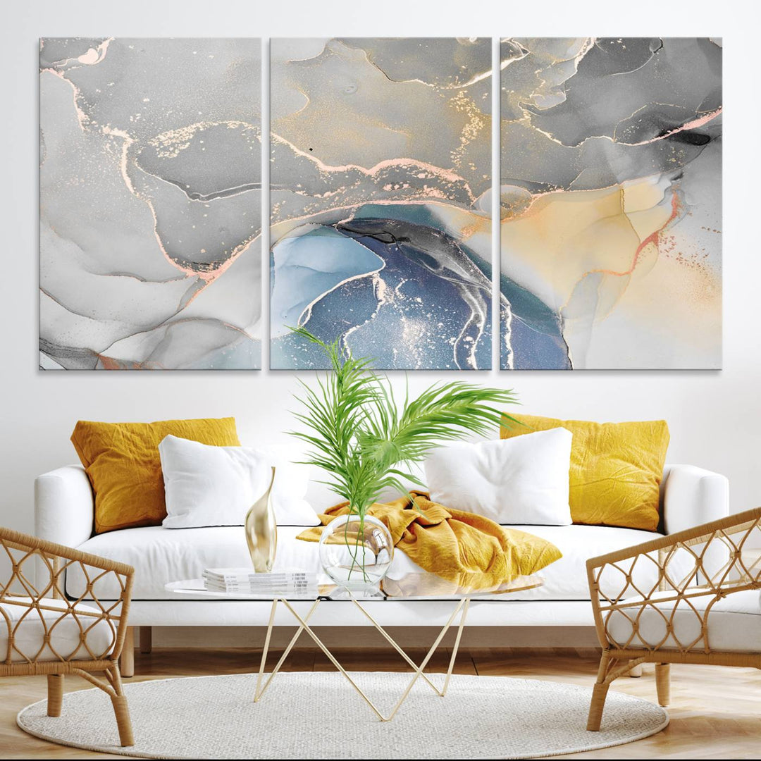 Gray Marble Fluid Effect Abstract Canvas with swirls of gray, gold, and blue.