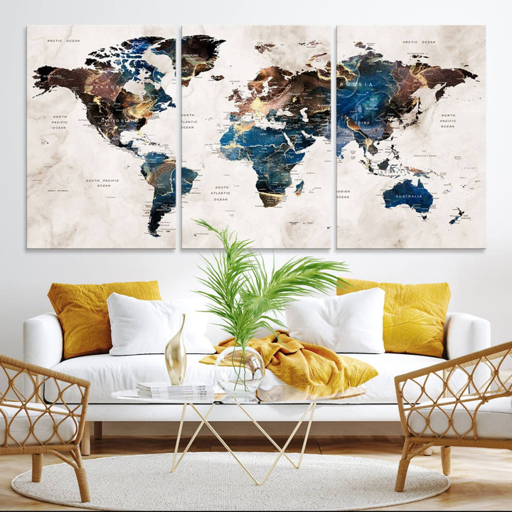 Abstract earth-toned 3-panel world map wall art featuring blues and browns, ready to hang; it showcases continents on modern canvas.