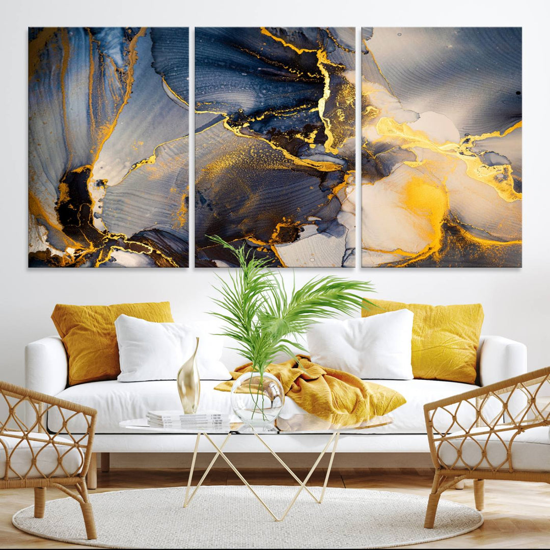 A modern luxury kitchen features a large gold and blue abstract canvas wall art print.