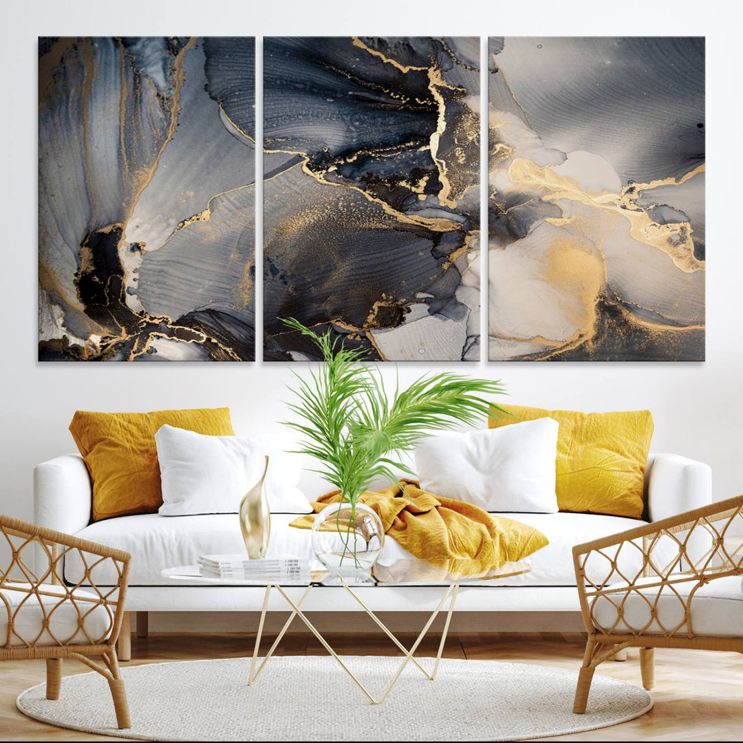 A Modern Marble Fluid Effect Abstract Wall Art with black, white, and gold swirls hangs in a modern kitchen.