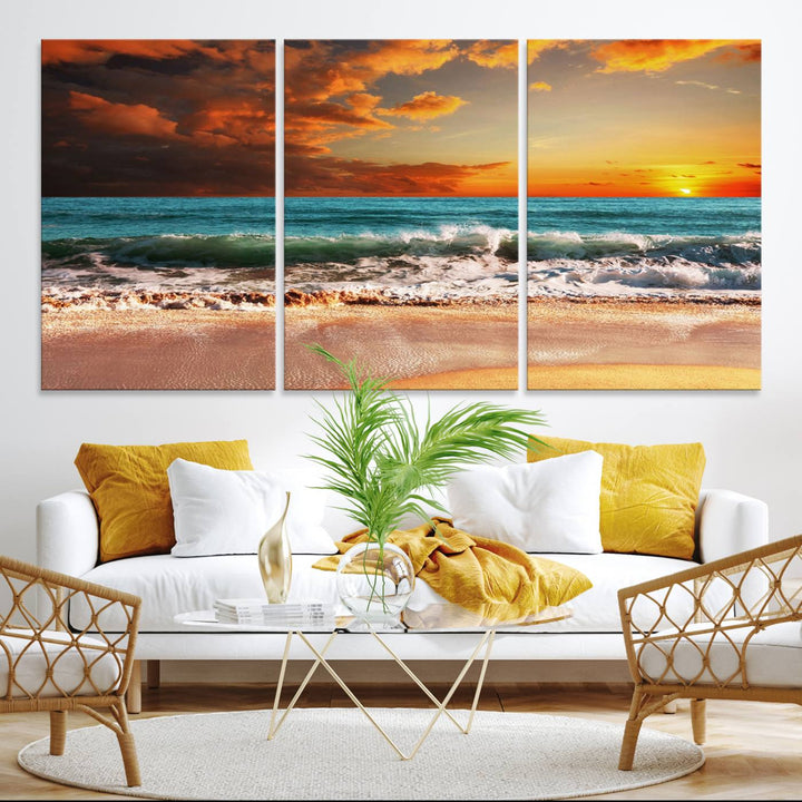 A Golden Sunset Beach triptych seascape canvas hangs on the wall.