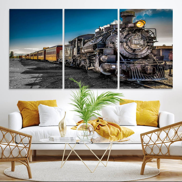 The Train Wall Art Canvas Print features a vintage steam train with a bright headlight.