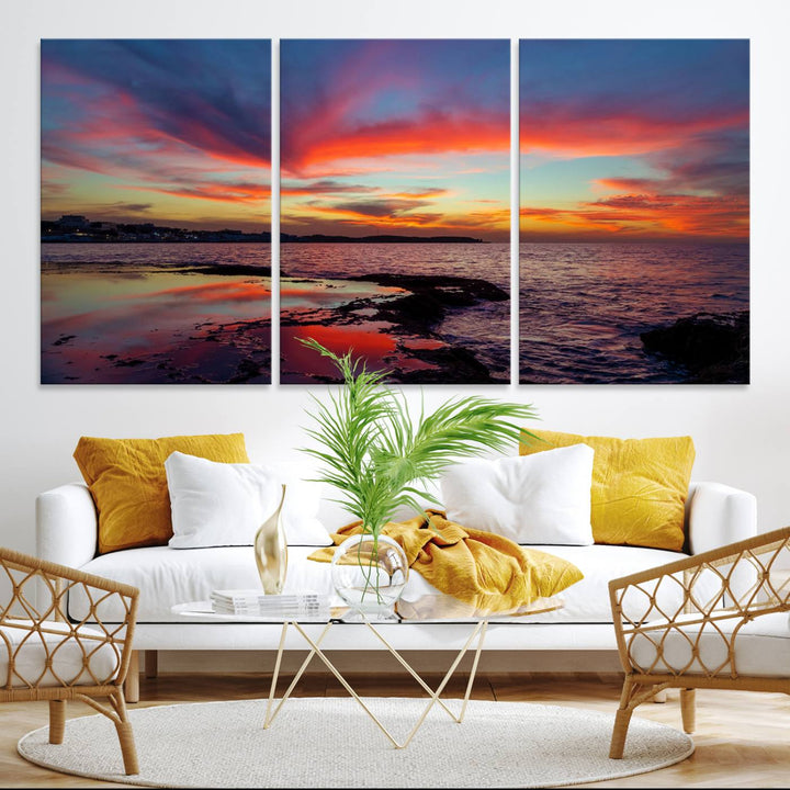 The Glorious Sunset on The Beach canvas print adorns the dining room.