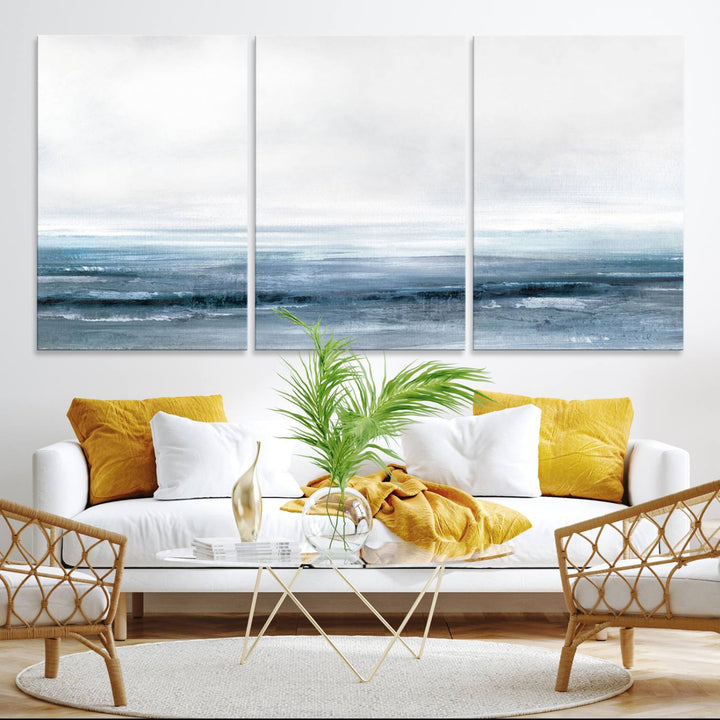 The dining area features Blue Ocean Abstract Artwork on canvas.