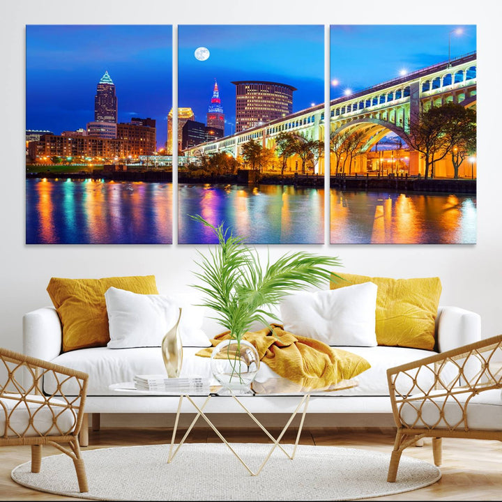 A Cleveland Night Skyline Wall Art on museum-quality canvas showcases a bridge and illuminated buildings.