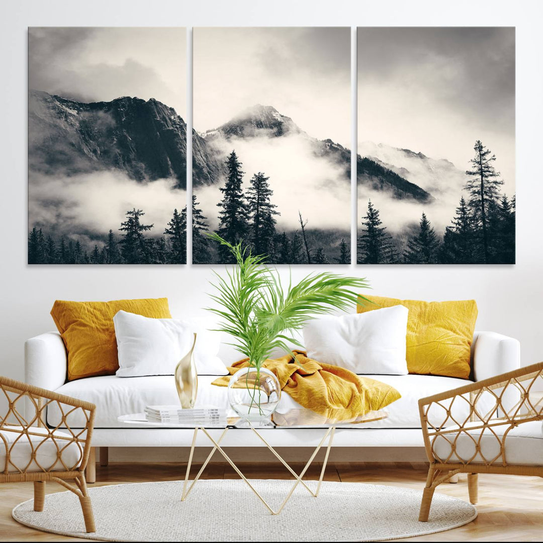 A large foggy mountain forest canvas print hangs prominently in the room.