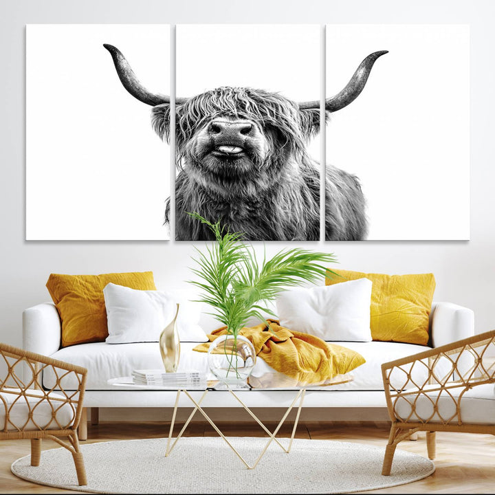 The Fanny Highland Cow art print decorates the modern kitchen, featured in black and white.