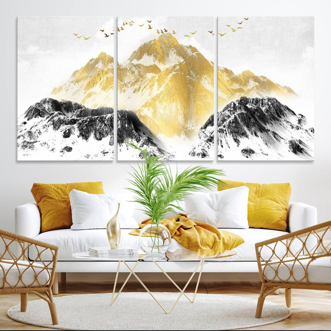 Golden Mountain Triptych Wall Art features gold-tinted mountains and birds.