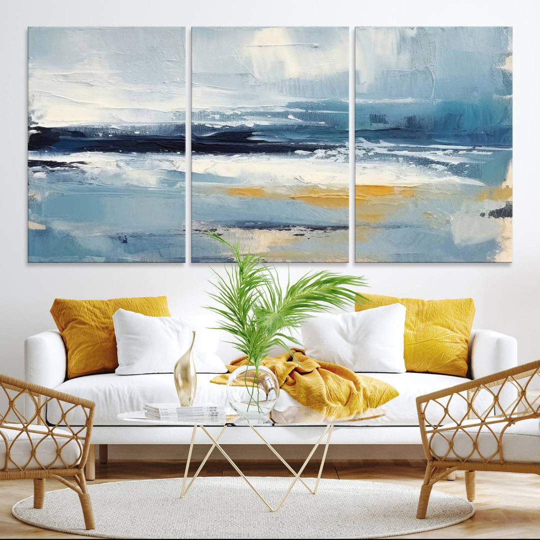 The Abstract Ocean Canvas Wall Art in coastal blue and gold enhances the modern kitchen.