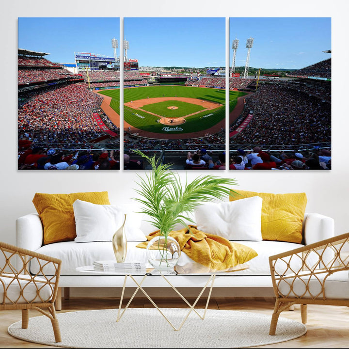 The Cincinnati Reds Baseball Team print of Great American Ball Park Stadium adorns the wall.