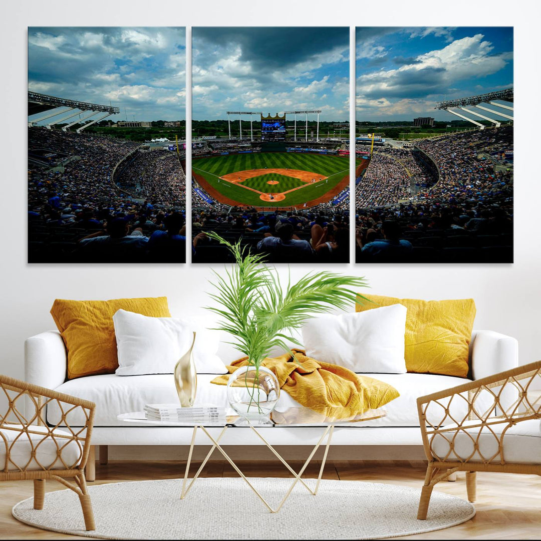 A 3-panel print of Kauffman Stadium, showcasing a crowded baseball field under cloudy skies.