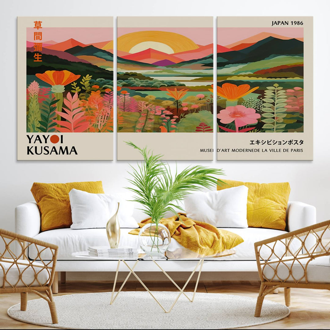 The Yayoi Kusama Landscape Canvas Print, featuring vibrant floral mountains and sunset scenery, enhances the room.