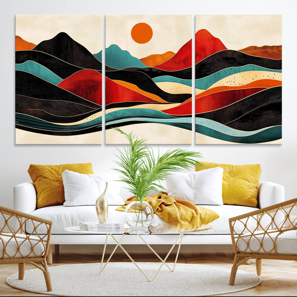 The Colorful Western Triptych Canvas features a vibrant mountain and sun design, making it perfect for modern kitchens or log cabin walls.