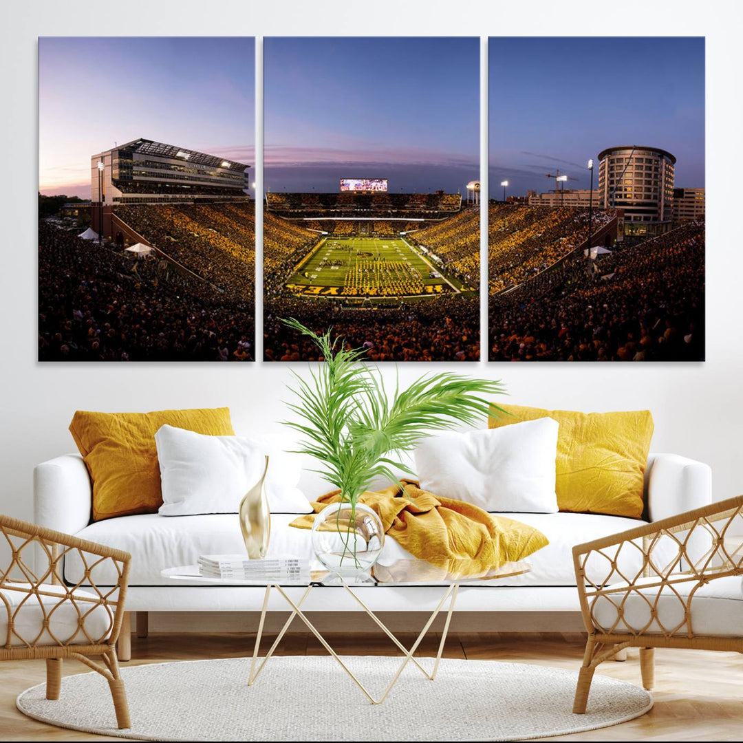 The Iowa Hawkeyes Kinnick Stadium Wall Art Canvas Print captures a sunset scene, making it perfect for display on a wall.