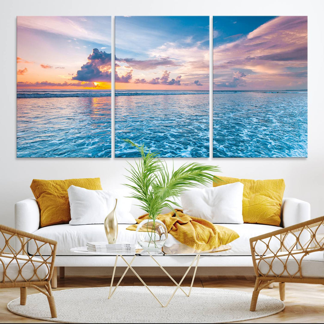 An Ocean Sunset Canvas Wall Art depicting a vibrant sky and rolling waves.