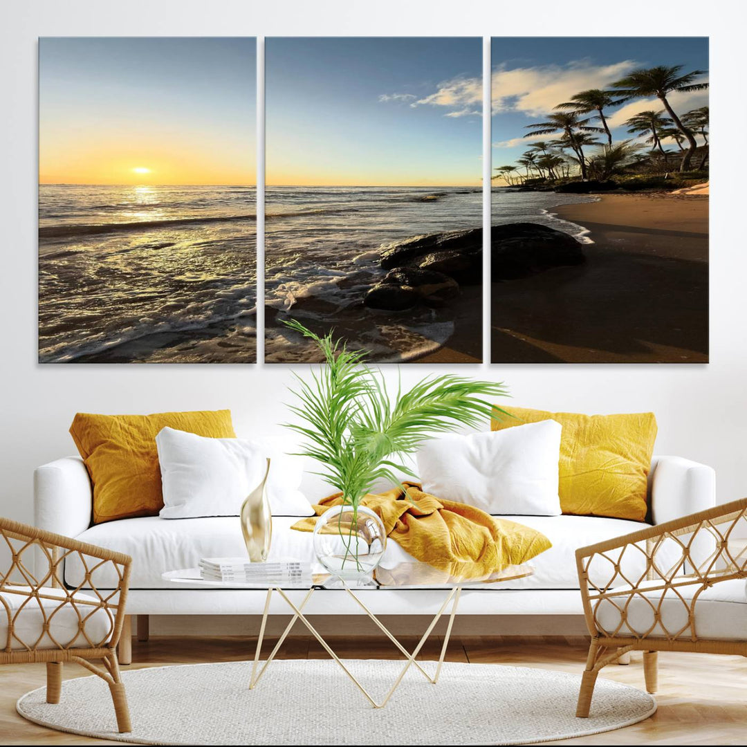 Canvas wall art depicting a beach ocean sunset with waves, palm trees, and rocks.