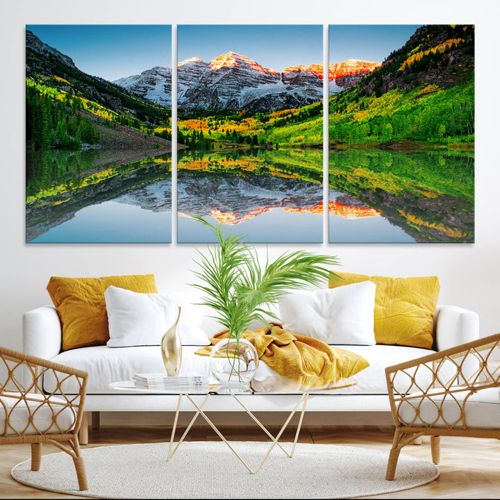 The Sunrise Maroon Bells Lake Wall Art Print beautifully captures North Maroon Peak mirrored in the tranquil lake, framed by lush greenery.