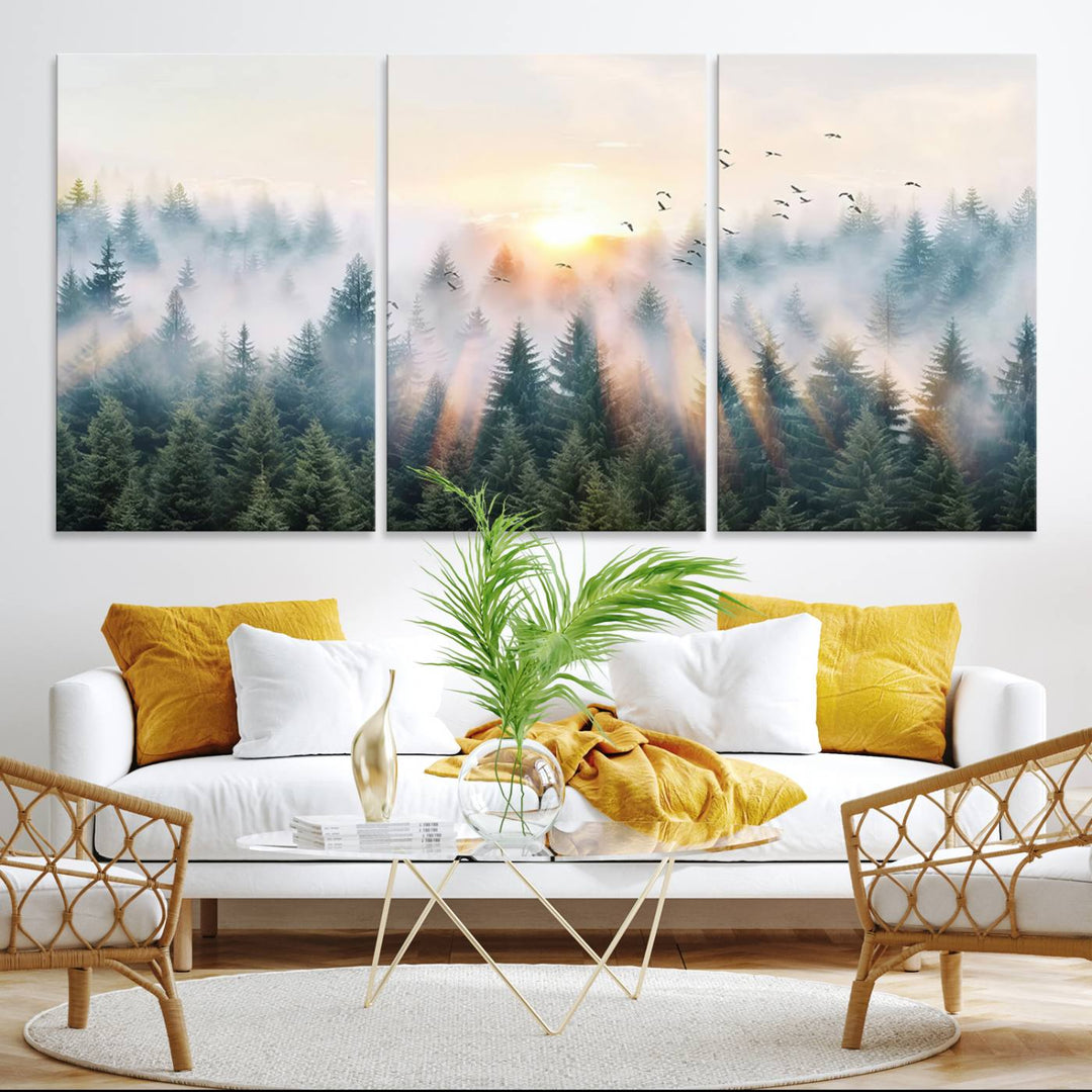 Misty Pine Forest Wall Art: A depiction of sunrise over foggy trees and birds against a bright sky; a framed woodland scene ideal for home or office decor.