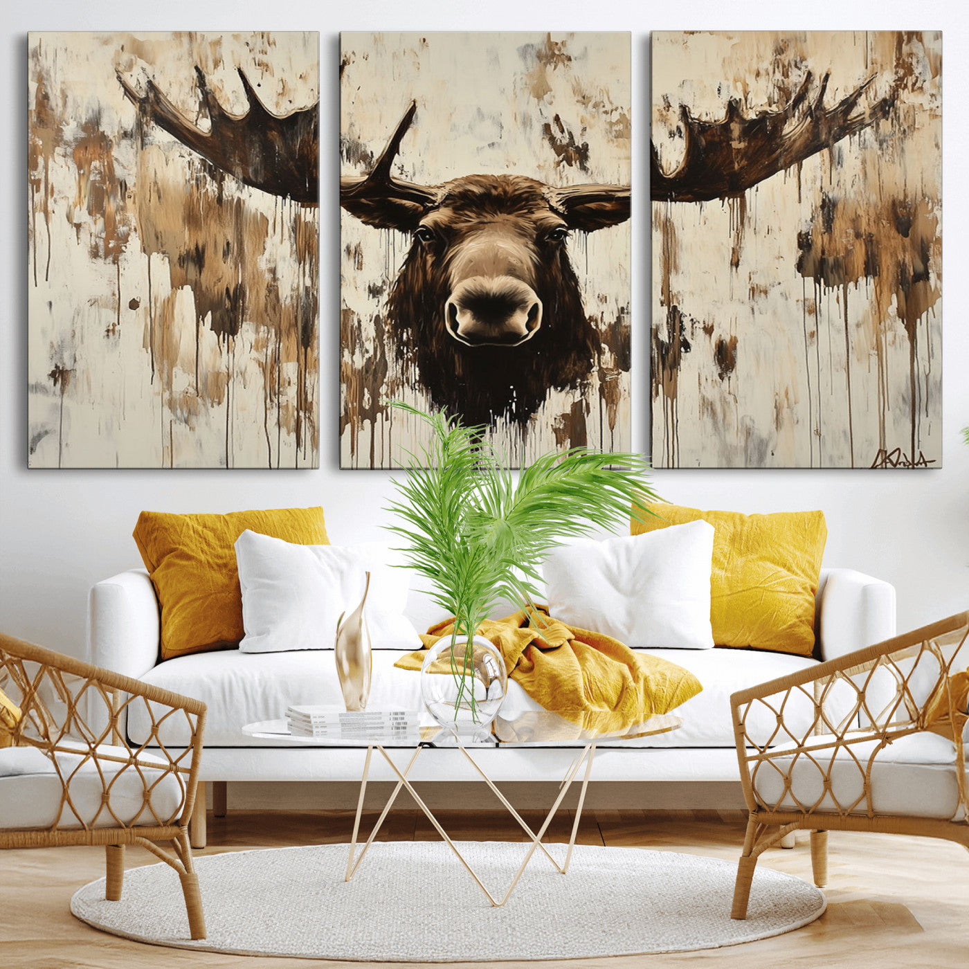 Expressive painting of a moose head with wide antlers in dark brown and beige tones, featuring paint drips and splatters on a light textured background, creating a striking rustic wall art canvas.