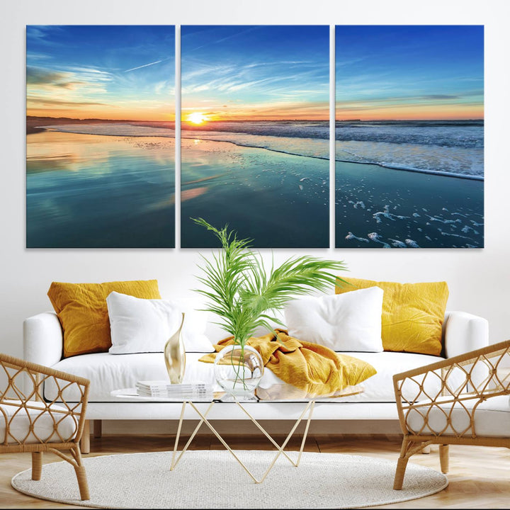 The Blue Sky and Beach Wall Art Canvas Print features a vibrant orange sky reflecting on wet sand.