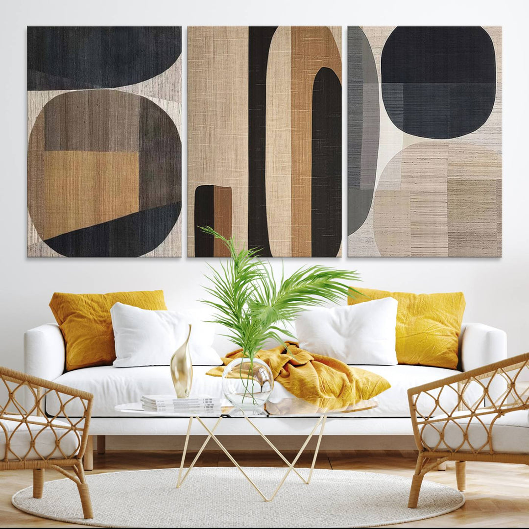 A modern dining room featuring neutral geometric boho abstract minimalist canvas art.