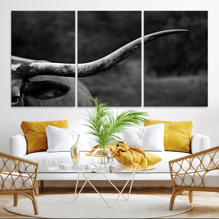 Cow Longhorn Wall Art: This black and white print adds rustic charm.