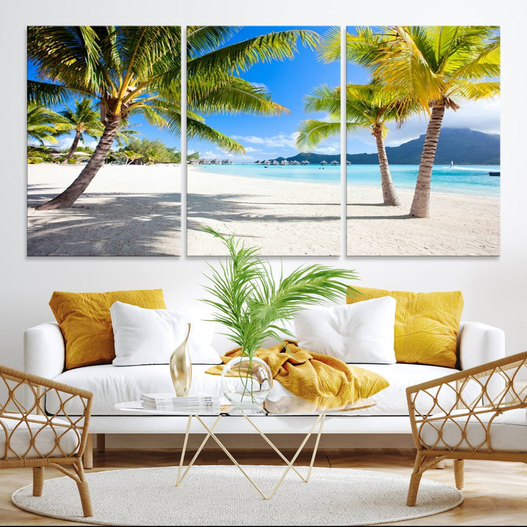 Blue Beach and Sea Wall Art Canvas Print: showcases a tropical scene with palm trees, white sand, and turquoise water.